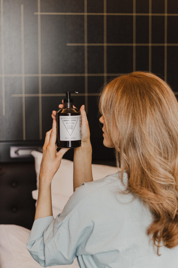 BJARMI liquid soap in 375 ml bottle, made in Iceland with natural oils and spring-inspired scent of black tea, rose, and cedar.