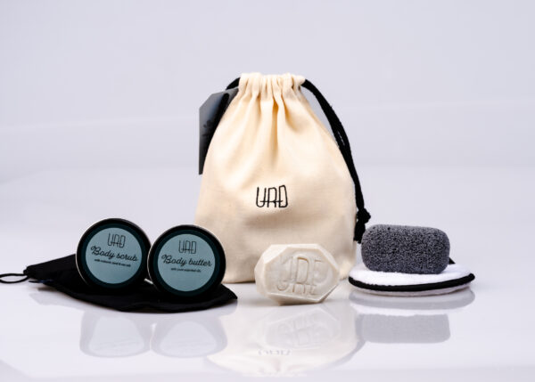 Handmade Icelandic spa kit with natural body butter, salt scrub, exfoliating glove, reusable pads, pumice stone and clay soap.
